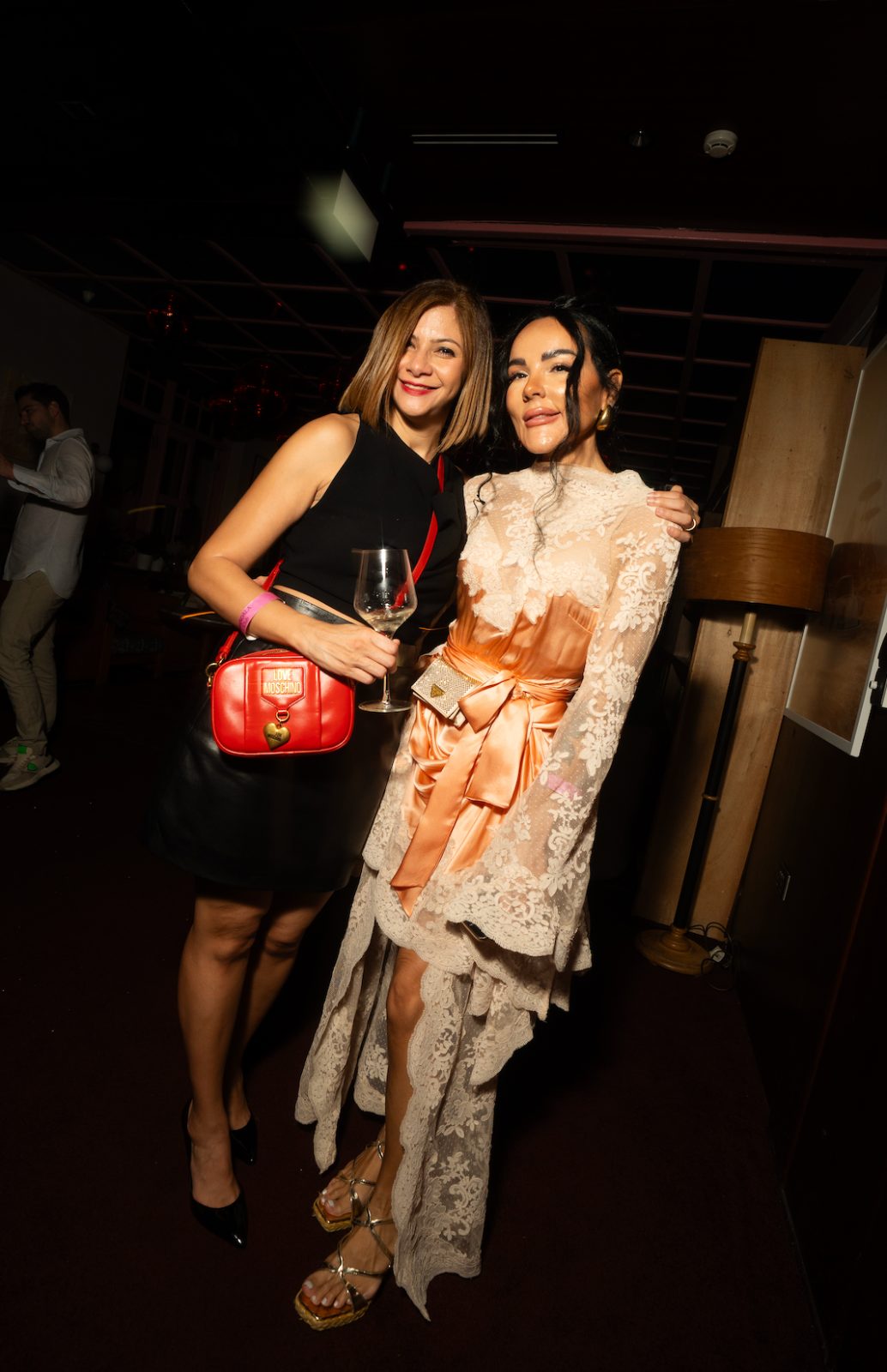 Two guests in evening dress at a Casa Très event — Monaco