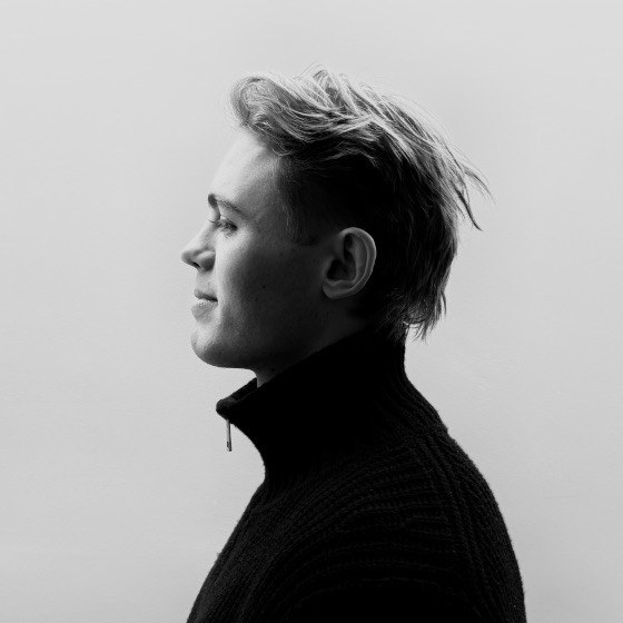 Piers Garrett, Creative and Marketing Director of Casa Très, in black and white profile